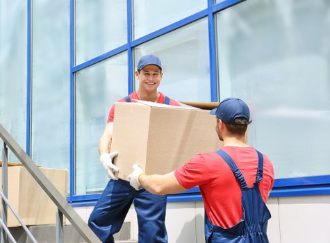 Removals team sorting recyclable materials during a sustainable move