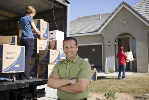Furniture and boxes secured inside a moving truck for transport