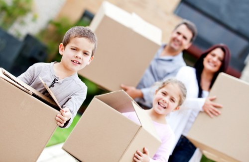 Local movers organizing boxes and labels for an apartment relocation in the Netherlands