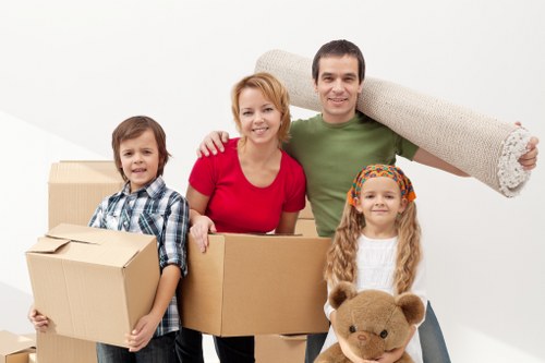Professional movers loading boxes for a local relocation