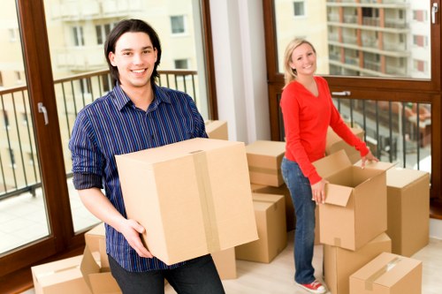 Staff assessing moving risks inside a property